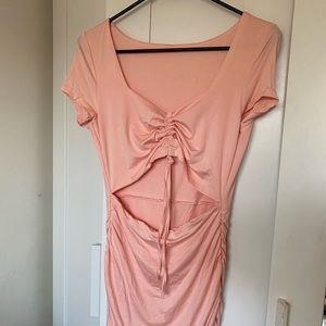 Bodycon dress with drawstrings and front cut out